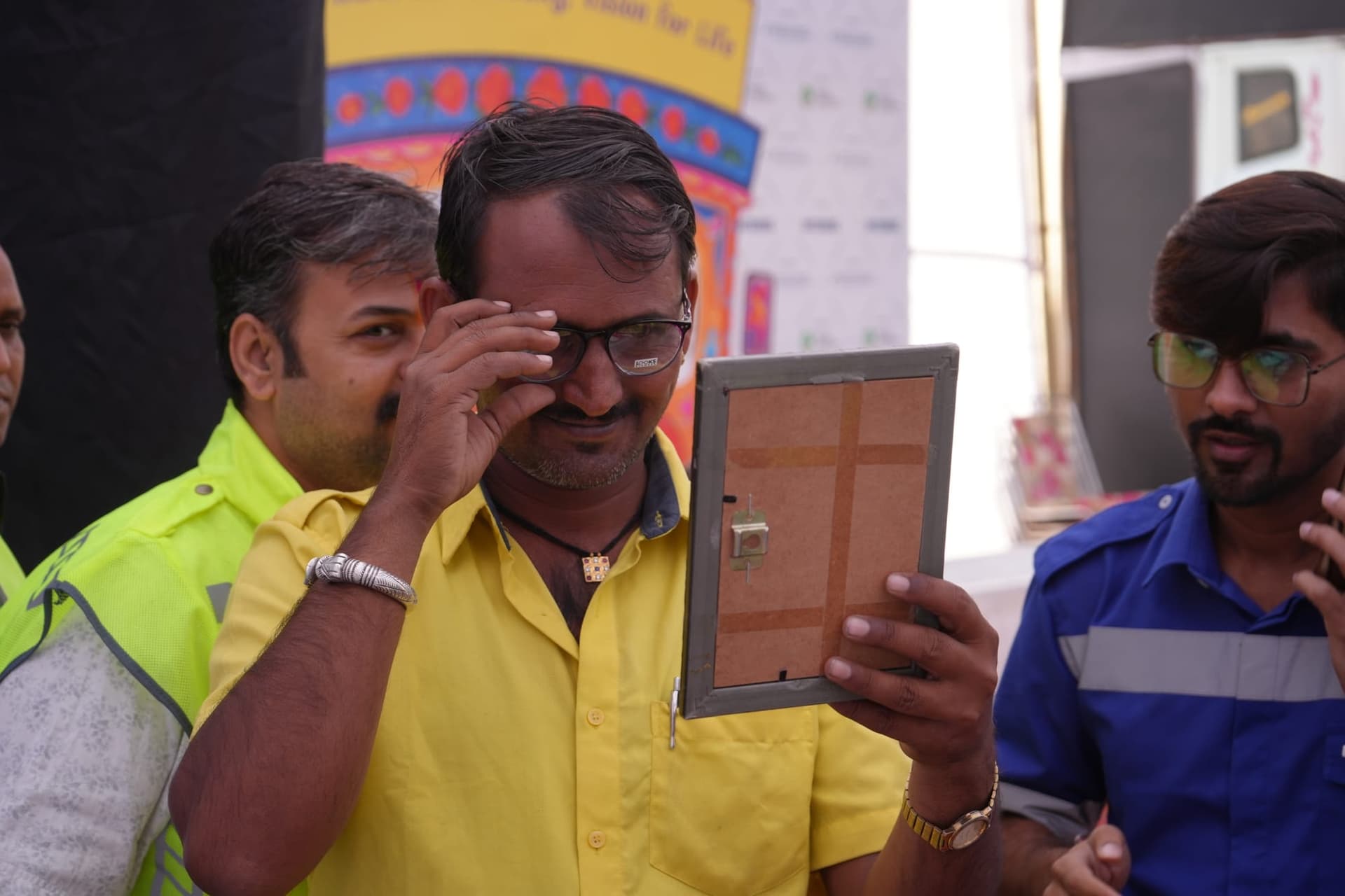 A patient undergoing a detailed eye test at a Roshni camp