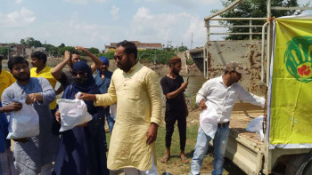 Ration distribution by Making  The Difference NGO  for poor people