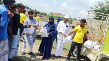 Ration distribution by Making  The Difference NGO