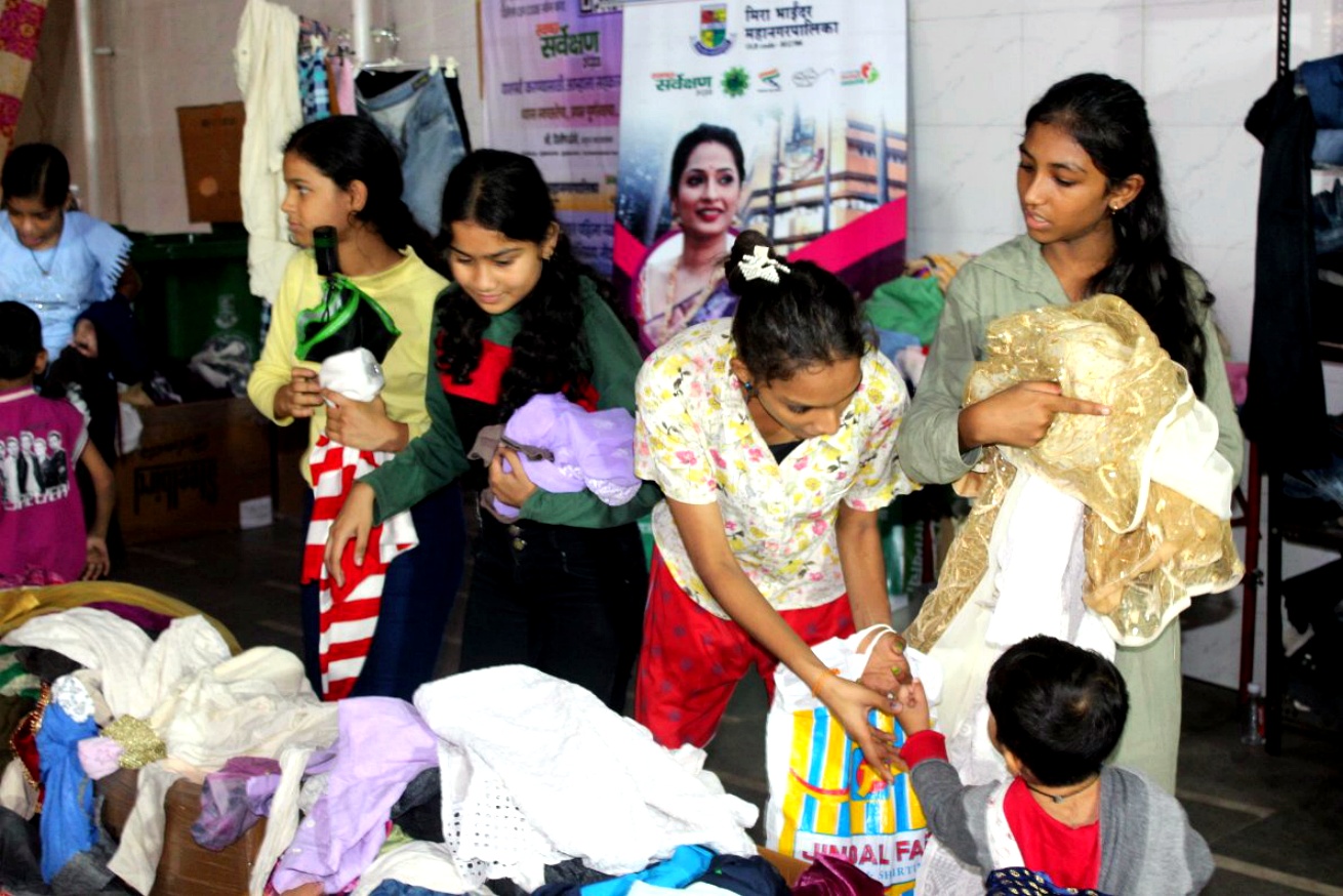 Folded clothes and household items prepared for donation