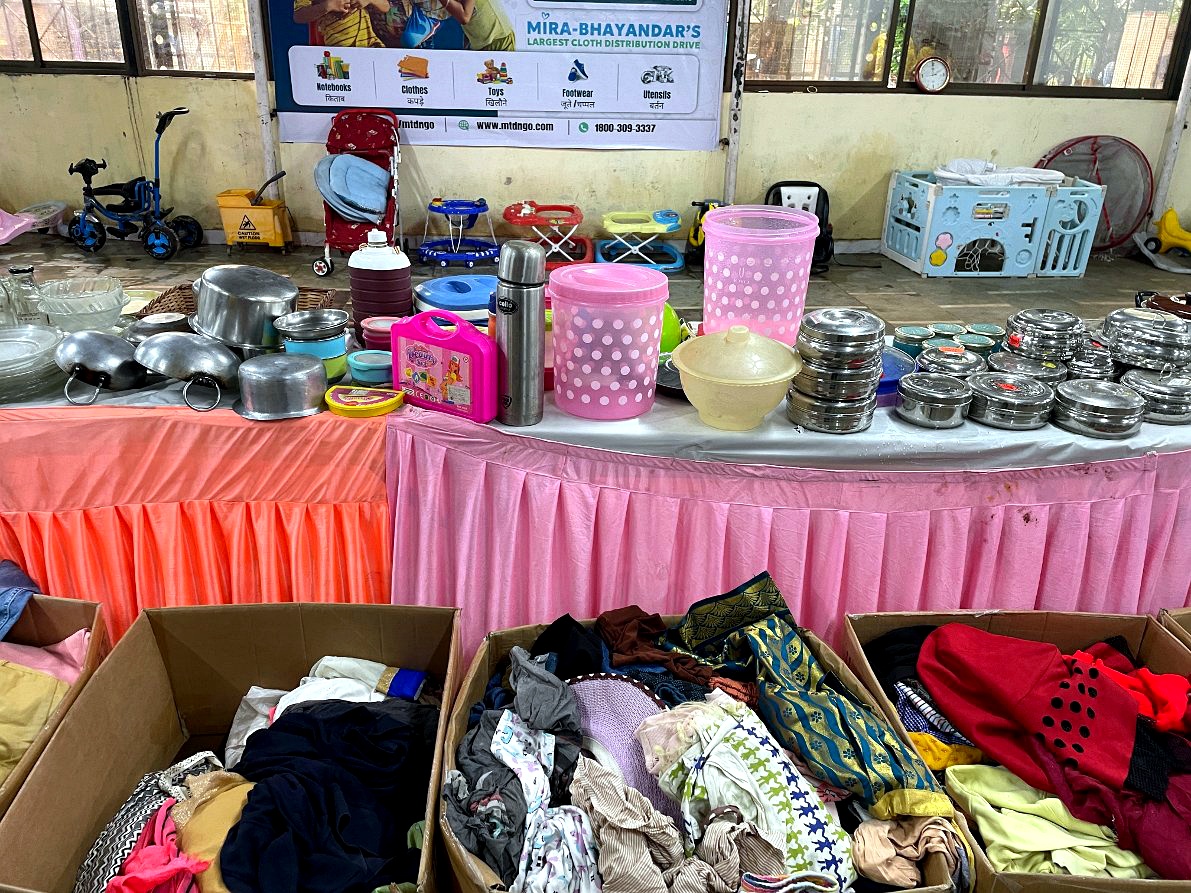 A community gathering to receive donated resources